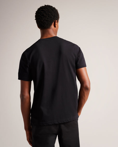 ACHRAM-Tops-Step up your style with ACHRAM. Short sleeves and regular fit means you're ready for any occasion, whether it's an evening on the town or a lazy afternoon at home. Finished with a logo print for a refined touch.The fabric of this product is made of 100% organic cotton. Organic cotton has a proven lower environmental impact than conventional cotton, as it reduces water usage, greenhouse gas emissions, and eliminates the use of harmful chemicals in the farming process. T-shirt 100% cotton Logo pri